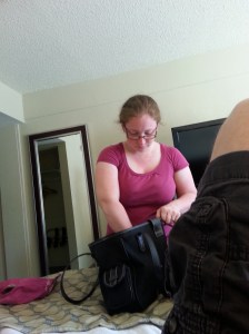 My wife packing as I lay there unable to move.
