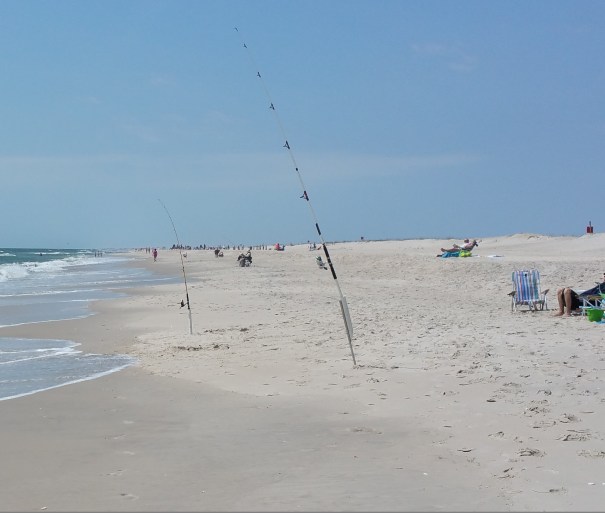 There is an invisible line running from this rod to the ocean... Quick reflexes can allow one  limbo mid-stride!